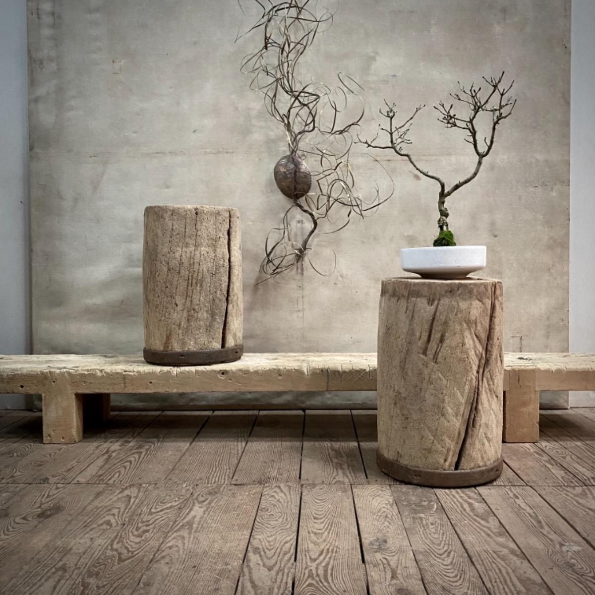 Primitive wooden pedestals 