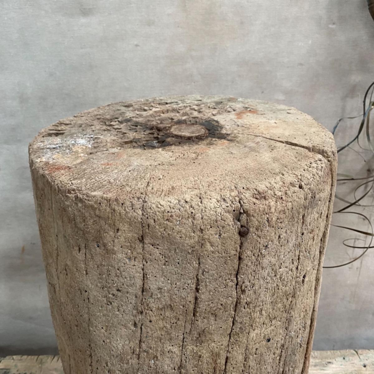 Primitive wooden pedestals 